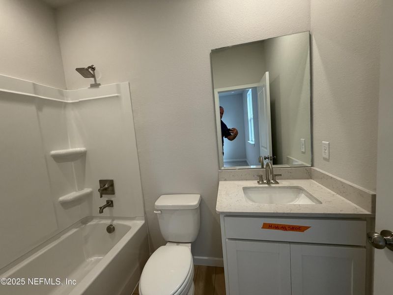 Furnished interior view inside a new home in The Magnolia Series at Reserve East, Flagler Beach (Image 12).