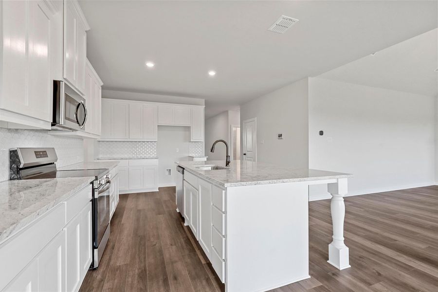 Representative furnished interior of a home built from the Garrison II by Cheldan Homes in Arbor Oaks, Boyd (Image 15).