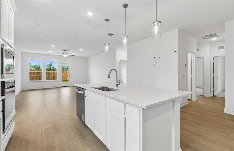 Kitchen with eat-in bartop island