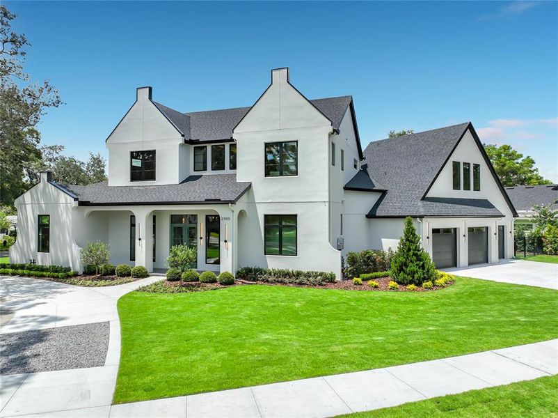 Front exterior of a new home in , Winter Park, FL, highlighting curb appeal (Image 26). Front exterior of a new home in , Winter Park, FL, highlighting curb appeal (Image 26).