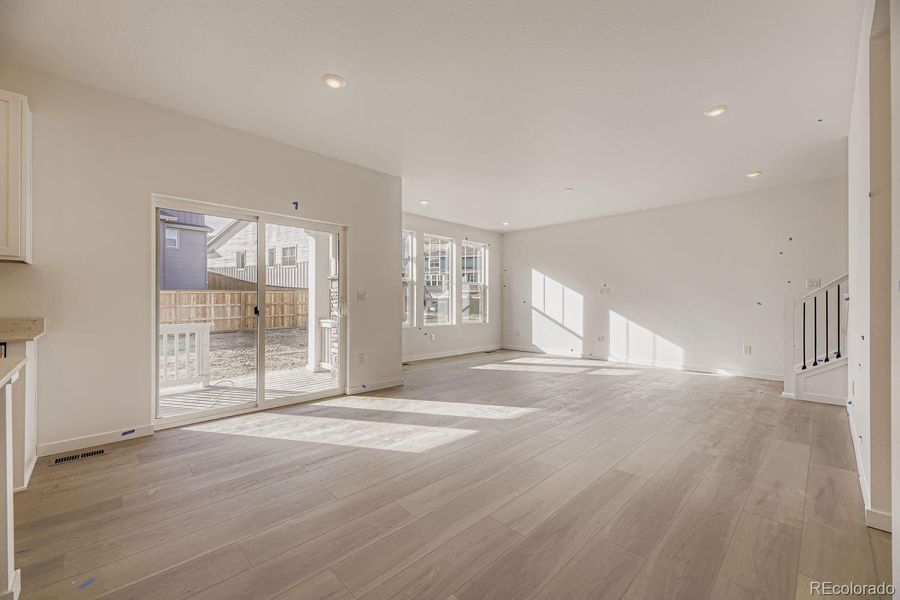 Spacious, unfurnished interior of a new home in Ken-Caryl Ranch: The Pioneer Collection, Littleton (Image 7).