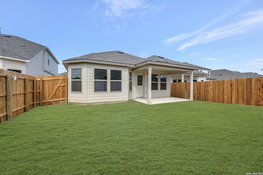 Exterior details and patio area of a home in Winding Brook, San Antonio (Image 28).