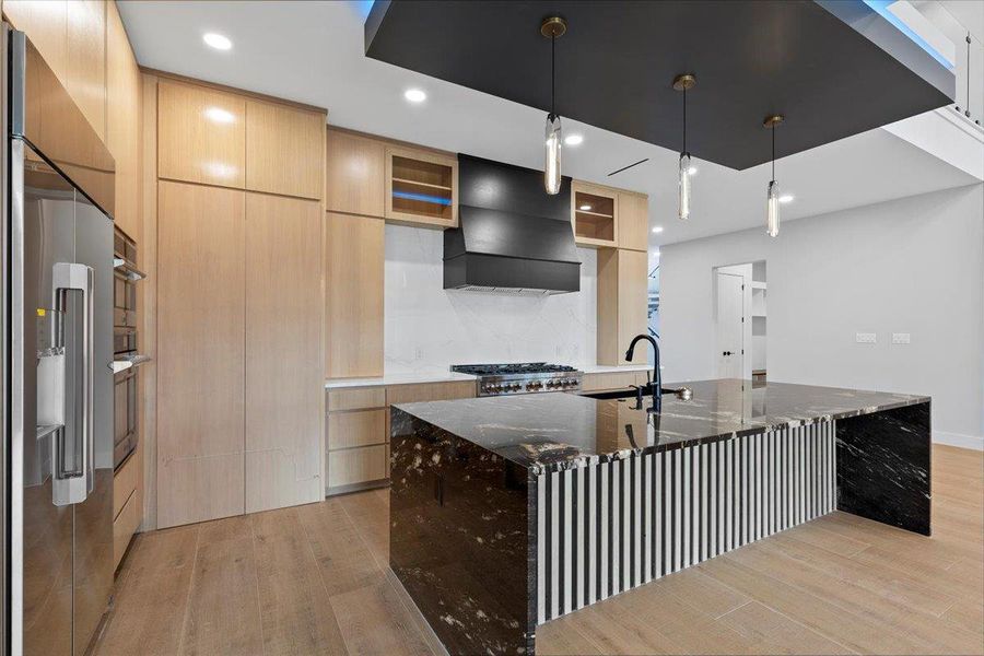 Kitchen multiple lighting accents, soft close drawers, premium granite, and Z-Line appliances. Kitchen multiple lighting accents, soft close drawers, premium granite, and Z-Line appliances.