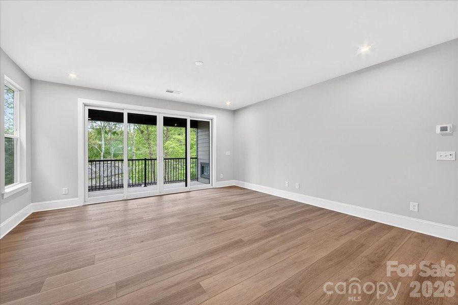 Large glass sliding doors to the outdoor living