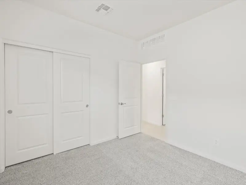 Spacious, unfurnished interior of a new home in Mandarina - Signature Series, Marana (Image 14).