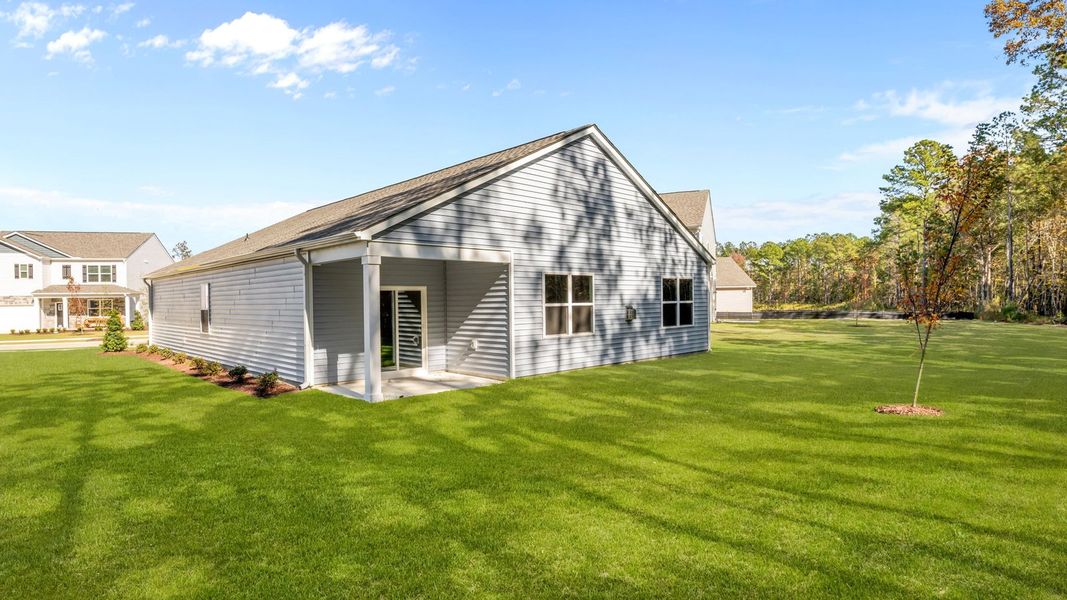 Exterior details and patio area of a home in West New Bern, New Bern (Image 19).