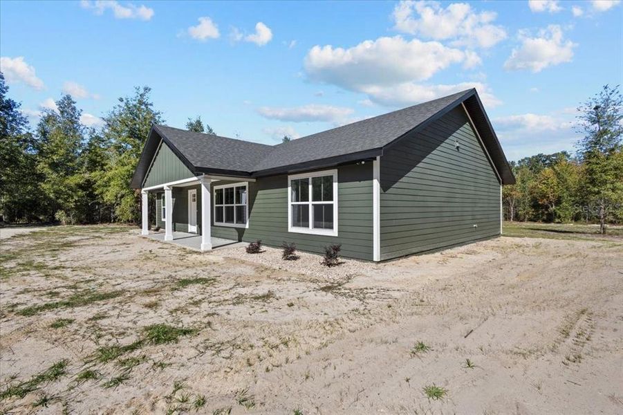 Exterior details and patio area of a home in , Bell (Image 3).