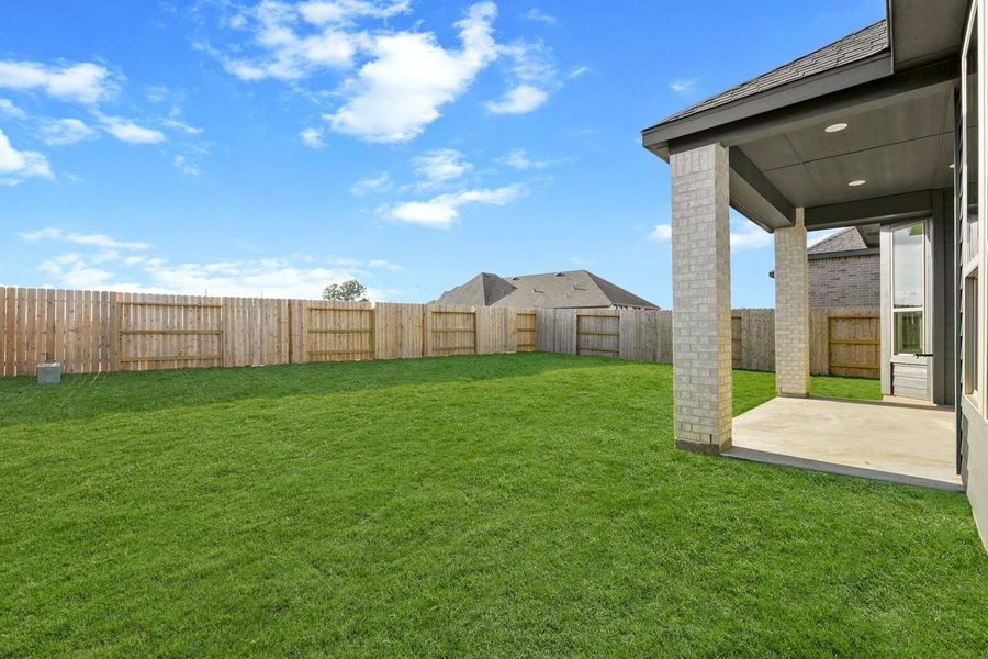 Exterior details and patio area of a home in Wildrye, Waller (Image 2). Exterior details and patio area of a home in Wildrye, Waller (Image 2).