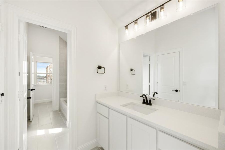 Furnished interior view inside a new home in Painted Tree Woodland District 50, McKinney (Image 14).