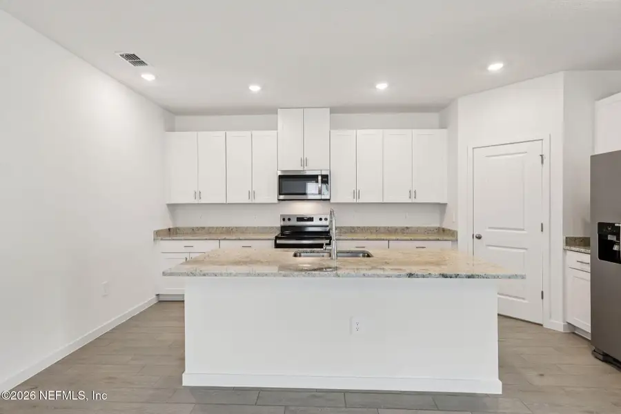 Furnished interior view inside a new home in Cypress Meadows - Signature Series, Jacksonville (Image 10).