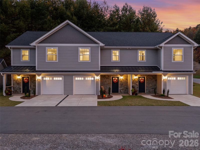 Front exterior of a new home in , Burnsville, NC, highlighting curb appeal (Image 27).