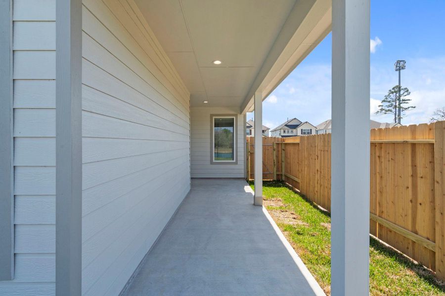 Exterior details and patio area of a home in Cypresswood Landing, Humble (Image 3).
