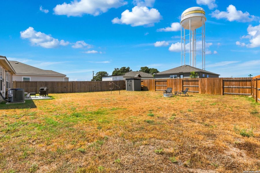 Exterior details and patio area of a home in Rosewood Estates, Lytle (Image 22).