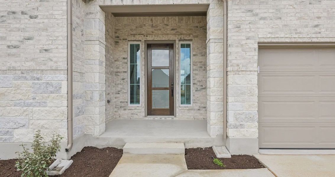 Exterior details and patio area of a home in Sunfield, Buda (Image 2). Exterior details and patio area of a home in Sunfield, Buda (Image 2).