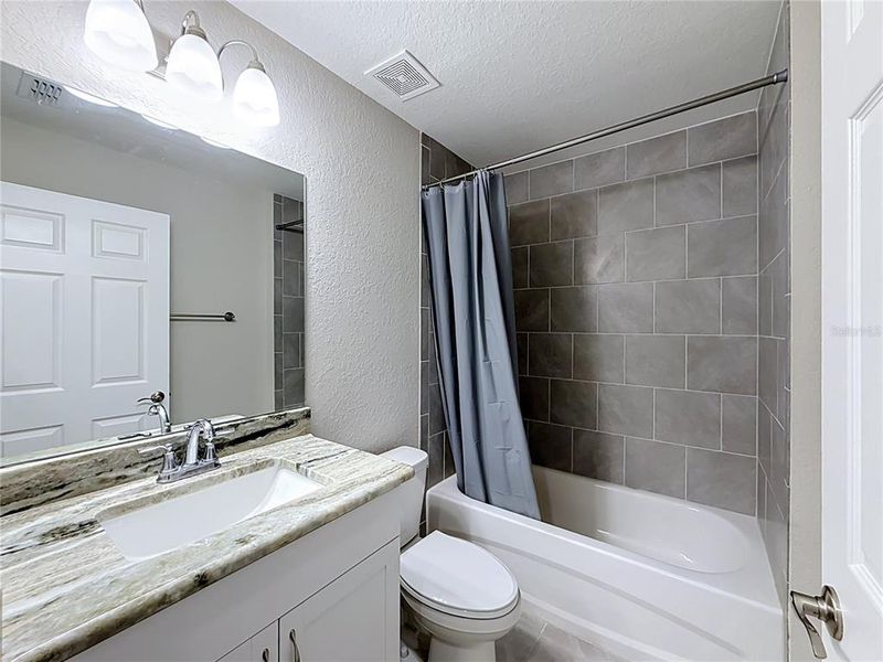 Furnished interior view inside a new home in , Dunnellon (Image 19).