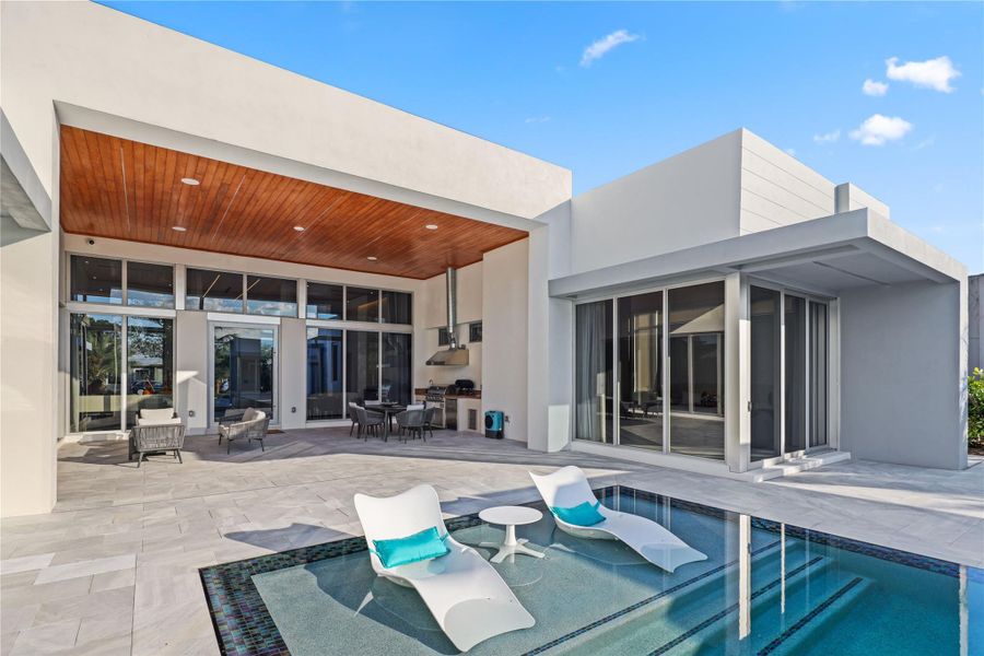 Exterior details and patio area of a home in , Parkland (Image 21).