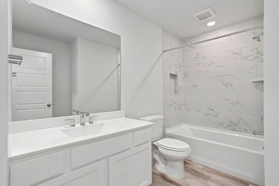 Furnished interior view inside a new home in Weston Oaks, San Antonio (Image 9).