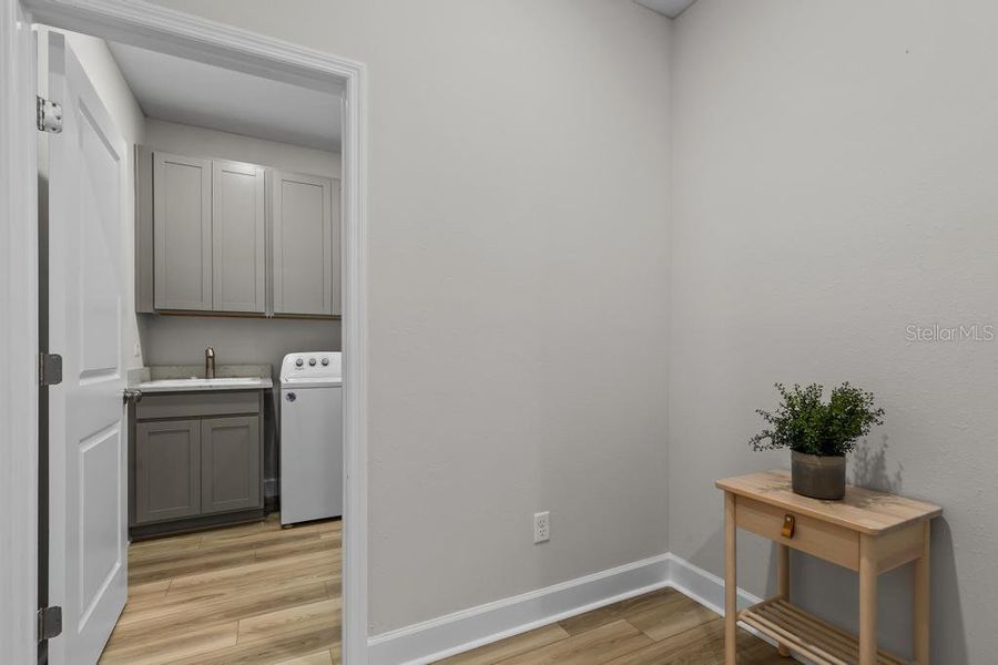 Furnished interior view inside a new home in The Cypress Series at Reserve East, Flagler Beach (Image 38).