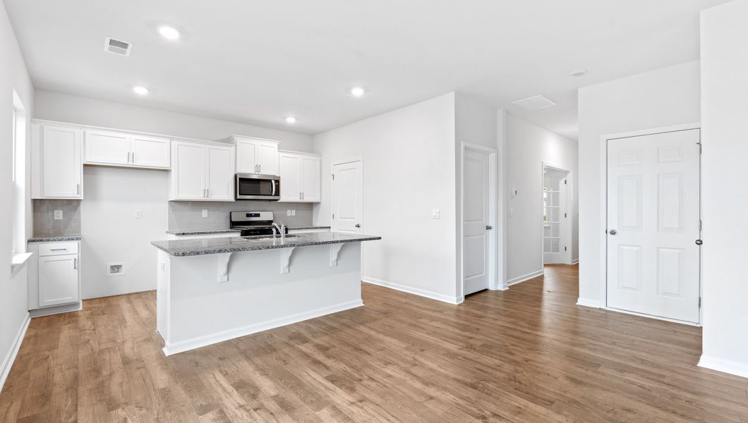 Furnished interior view inside a new home in Sage Grove, Lyman (Image 13).