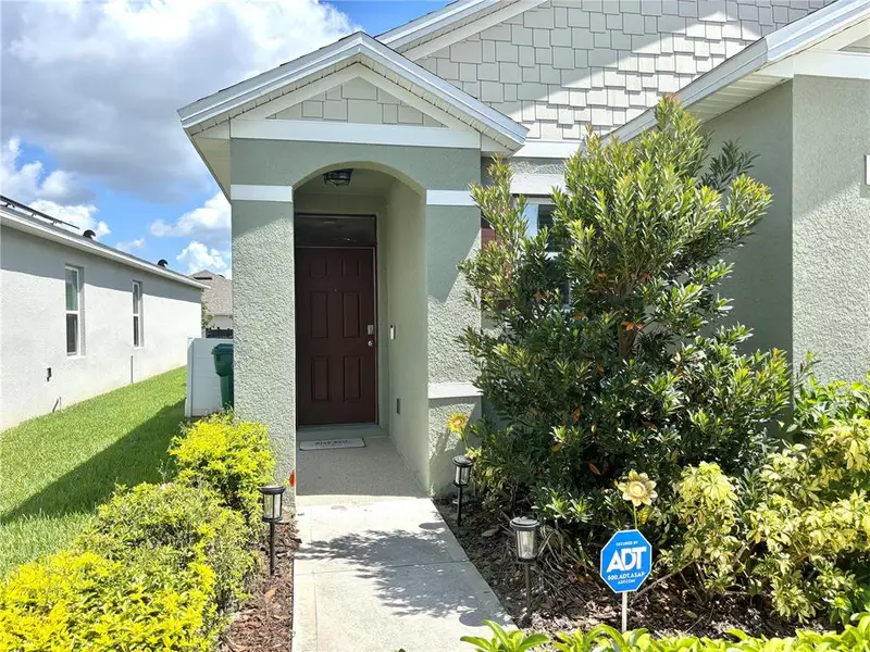 Exterior details and patio area of a home in Victoria Oaks, Deland (Image 3).