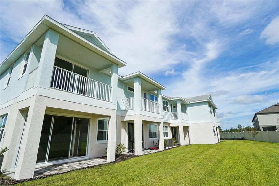 Front exterior of a new home in Lagoon Residences at Epperson, Wesley Chapel, FL, highlighting curb appeal (Image 24). Front exterior of a new home in Lagoon Residences at Epperson, Wesley Chapel, FL, highlighting curb appeal (Image 24).