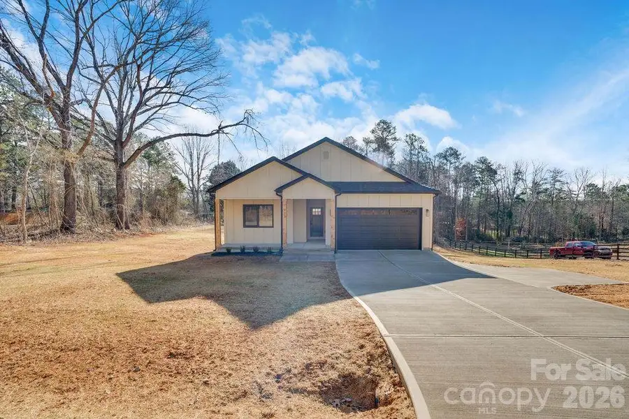 Front exterior of a new home in , Iron Station, NC, highlighting curb appeal (Image 2). Front exterior of a new home in , Iron Station, NC, highlighting curb appeal (Image 2).