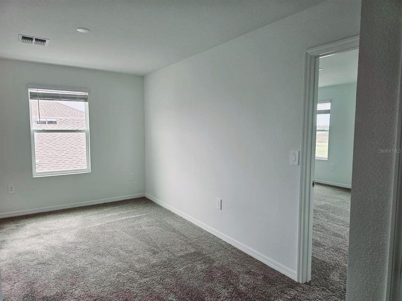 Spacious, unfurnished interior of a new home in Peace Creek Reserve, Winter Haven (Image 8).