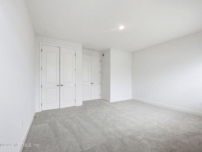 Spacious, unfurnished interior of a new home in Silver Landing At Silverleaf, St. Augustine (Image 61).