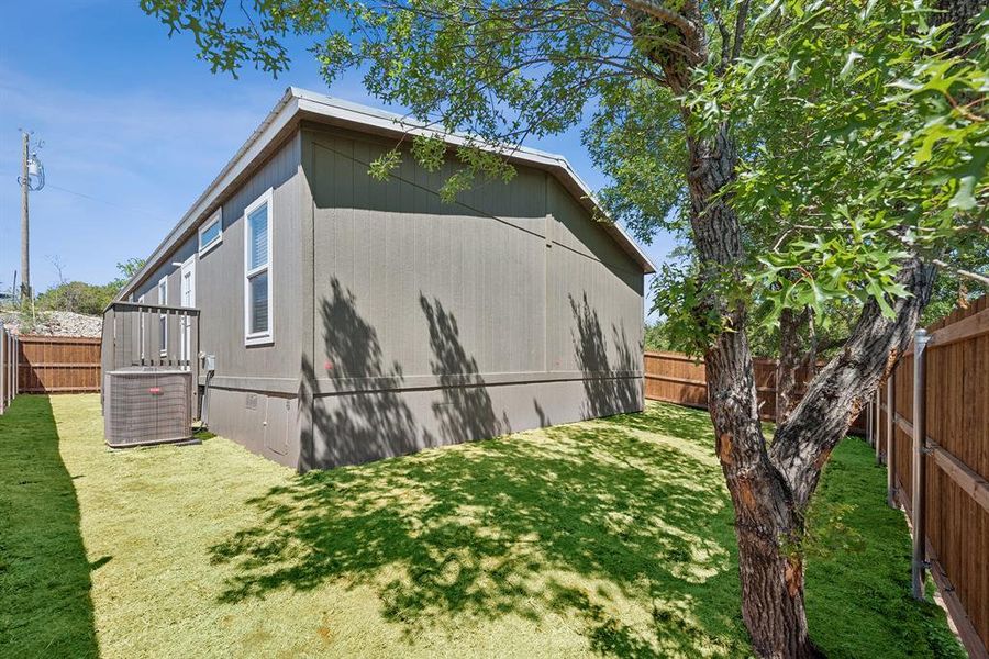 Exterior details and patio area of a home in , Granbury (Image 23).