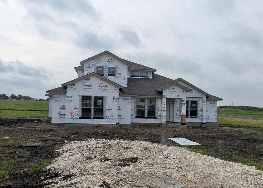 Front exterior of a home in the Scofield Farms Estates community, located in Georgetown, TX (Image 2).