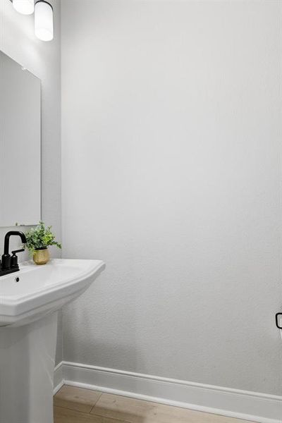 Powder bathroom on main level. Powder bathroom on main level.