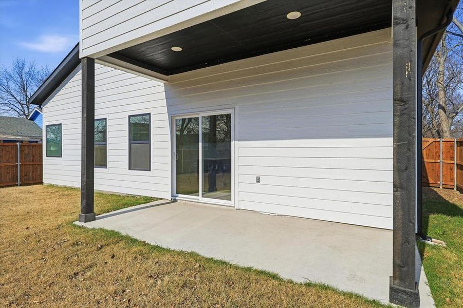 Back of property with a patio area