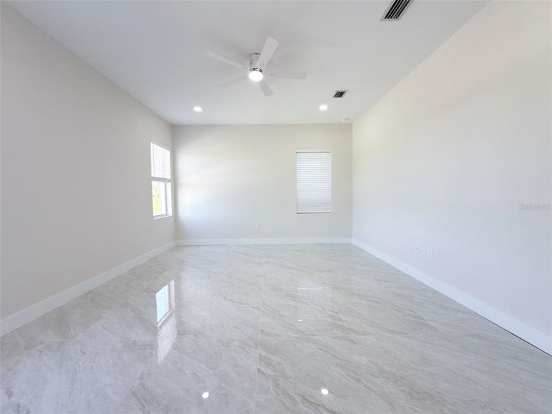 Spacious, unfurnished interior of a new home in , Port Charlotte (Image 21).