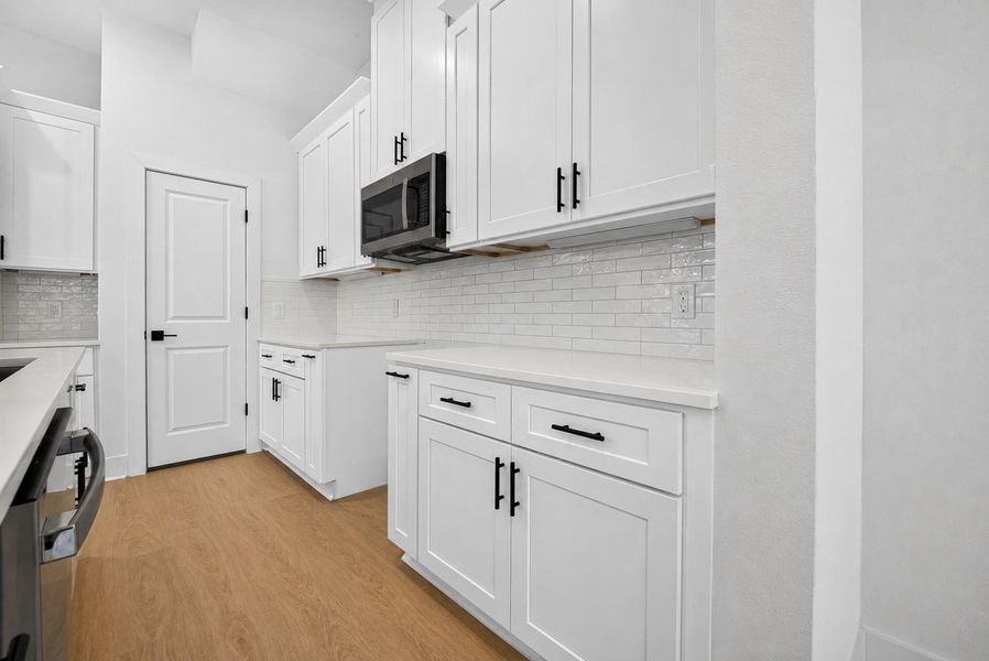 Shaker cabinets and walk-in pantry area - Stove will be installed Shaker cabinets and walk-in pantry area - Stove will be installed