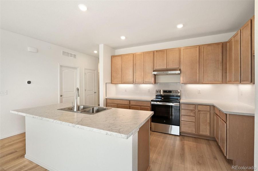 Furnished interior view inside a new home in Turnberry, Commerce City (Image 12).
