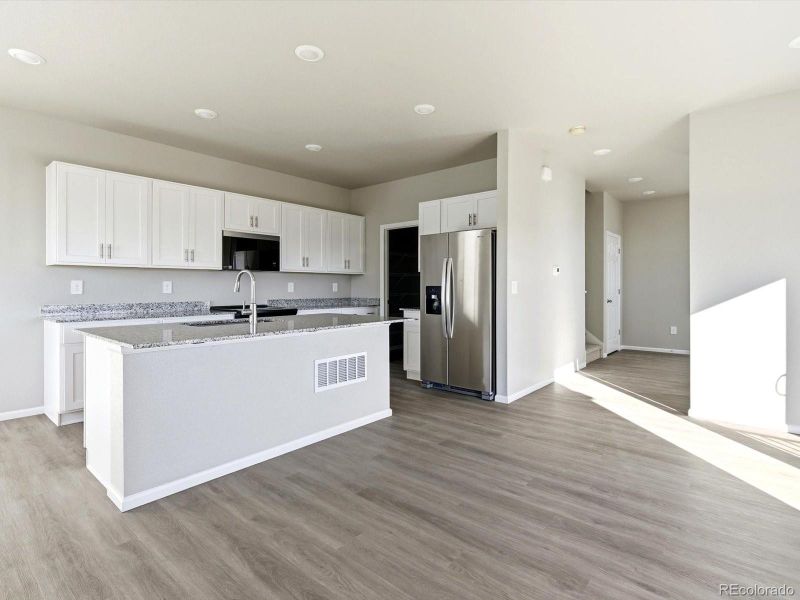 Furnished interior view inside a new home in , Thornton (Image 9).