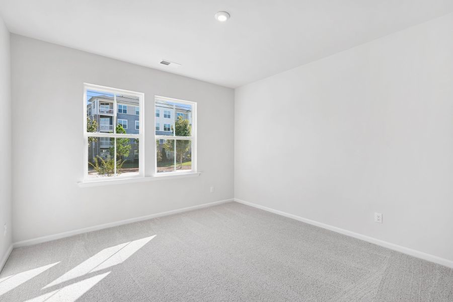 Representative unfurnished interior of a home built from the Nola by Tri Pointe Homes in The Grove at Latta Park, Durham (Image 14).