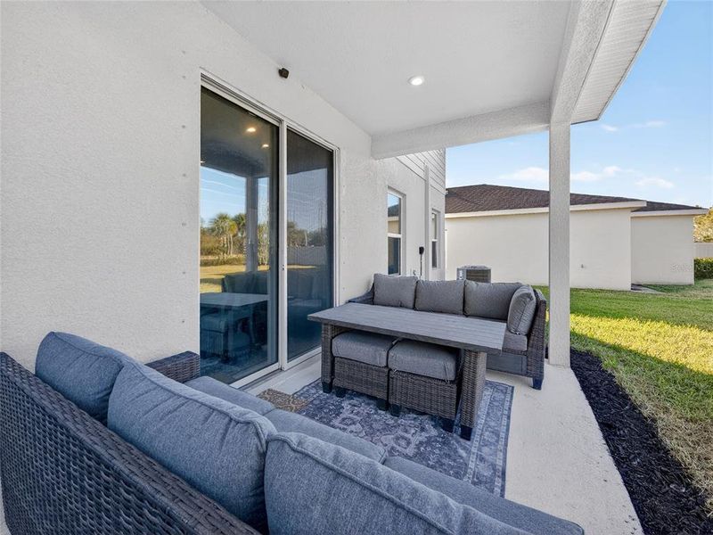 Exterior details and patio area of a home in Summerwoods, Parrish (Image 22).