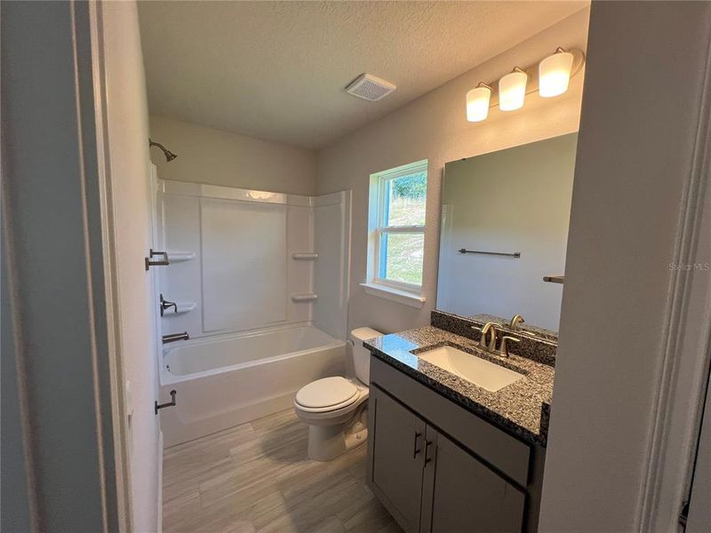 Furnished interior view inside a new home in , Dade City (Image 7).