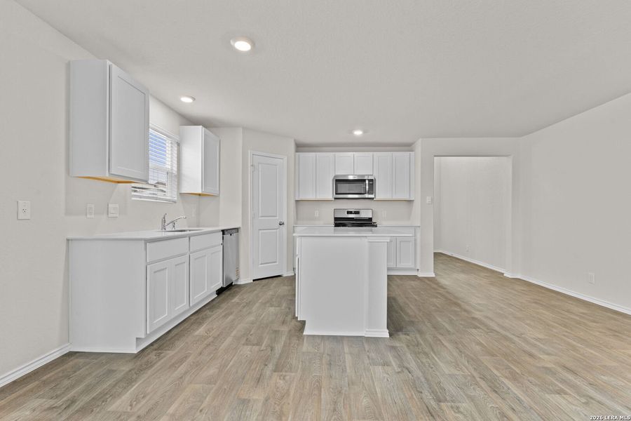 Furnished interior view inside a new home in Redbird Ranch, San Antonio (Image 10).