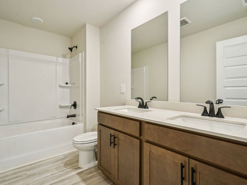 The Dakota Basement floorplan with the Calm Latte interior package.