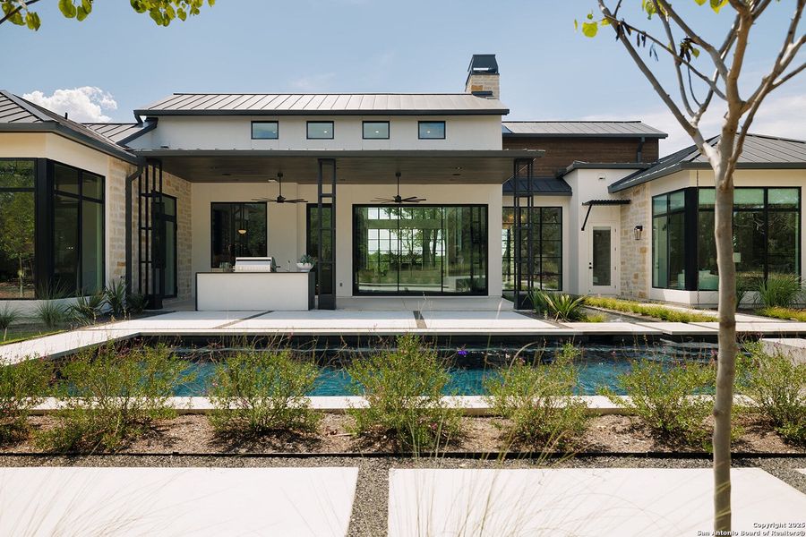 Front exterior of a new home in , Boerne, TX, highlighting curb appeal (Image 2).