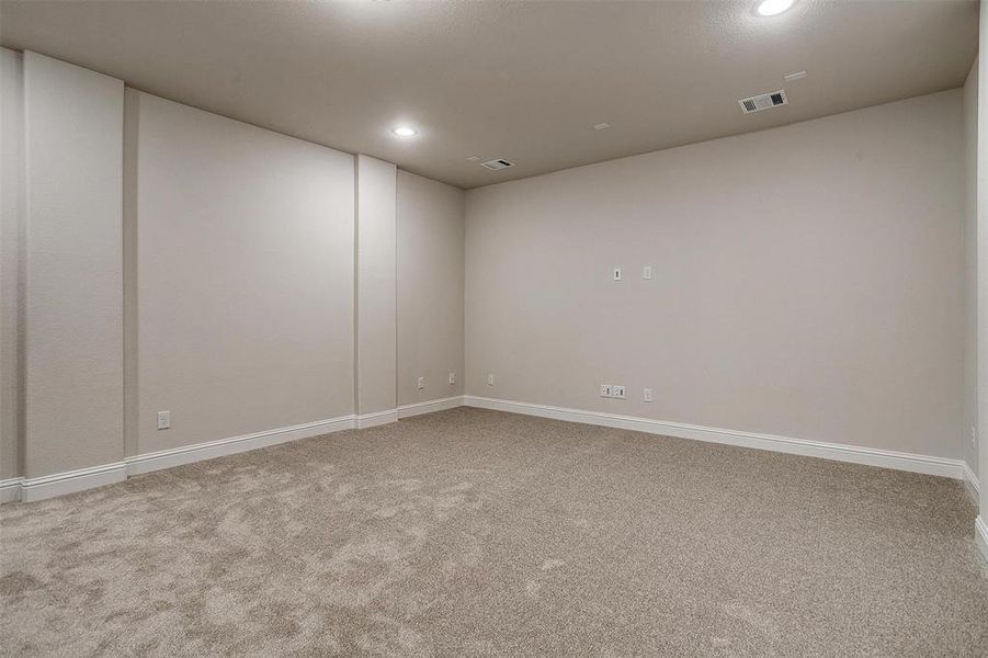 Unfurnished room with carpet flooring