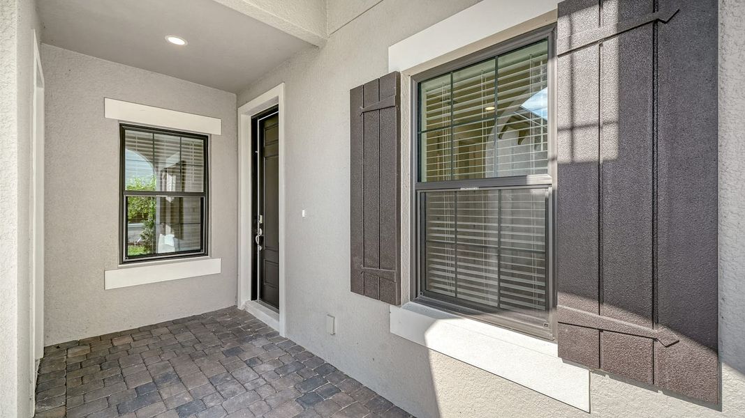 Exterior details and patio area of a home in Vistera of Venice Real Estate and Homes for Sale in Venice, FL - Neal Communities, Nokomis (Image 22).