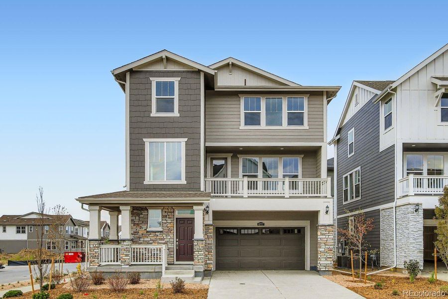 Front exterior of a new home in Parterre: The Skyline Collection, Thornton, CO, highlighting curb appeal (Image 1).