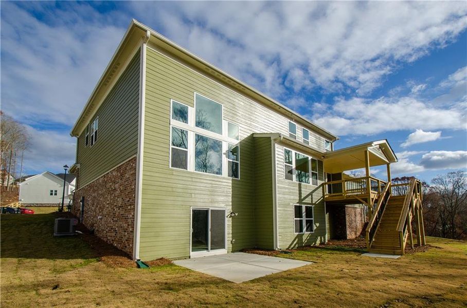 Front exterior of a new home in , Ball Ground, GA, highlighting curb appeal (Image 2).