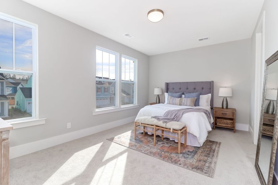 Representative furnished interior of a home built from the Inverness P by True Homes in Homecoming, Ravenel (Image 14).