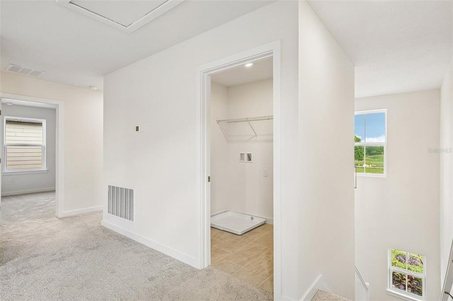 Spacious, unfurnished interior of a new home in Grasslands West, Lakeland (Image 29).