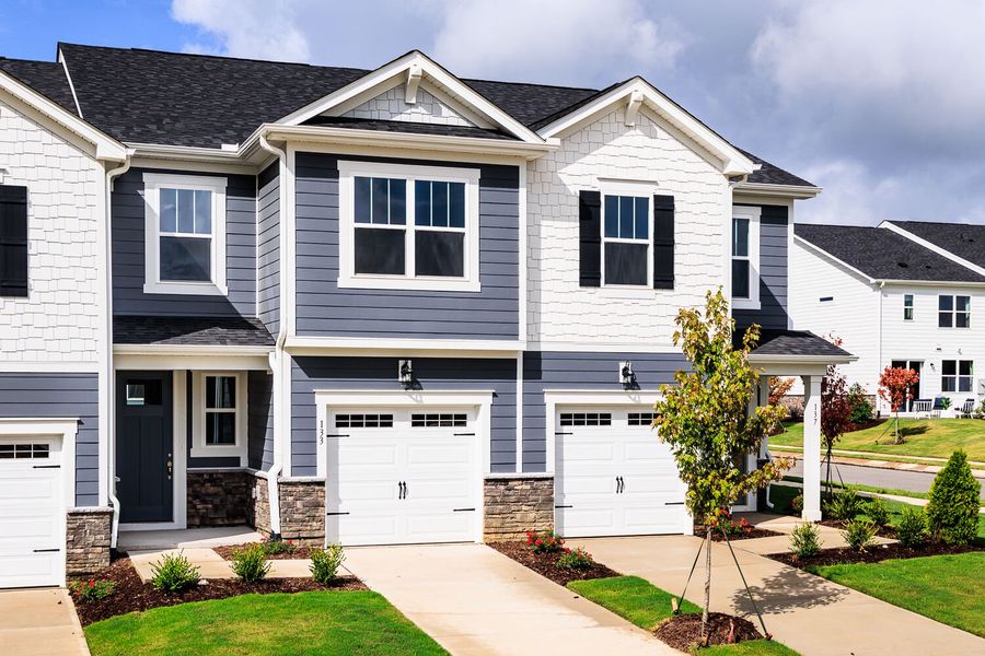 Front exterior of a new home in Vaughan Farms, Angier, NC, highlighting curb appeal (Image 2). Front exterior of a new home in Vaughan Farms, Angier, NC, highlighting curb appeal (Image 2).