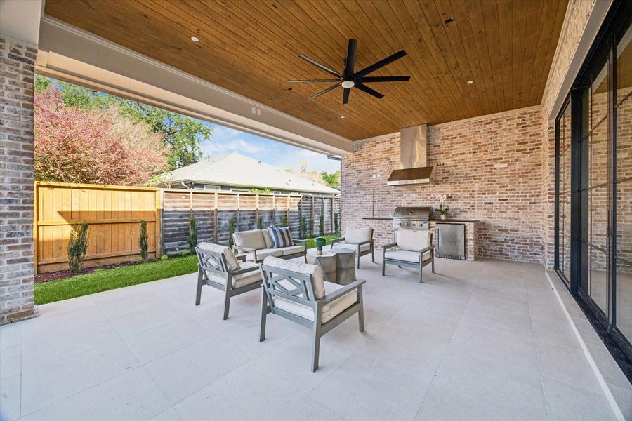 Exterior details and patio area of a home in , Spring Valley Village (Image 3).